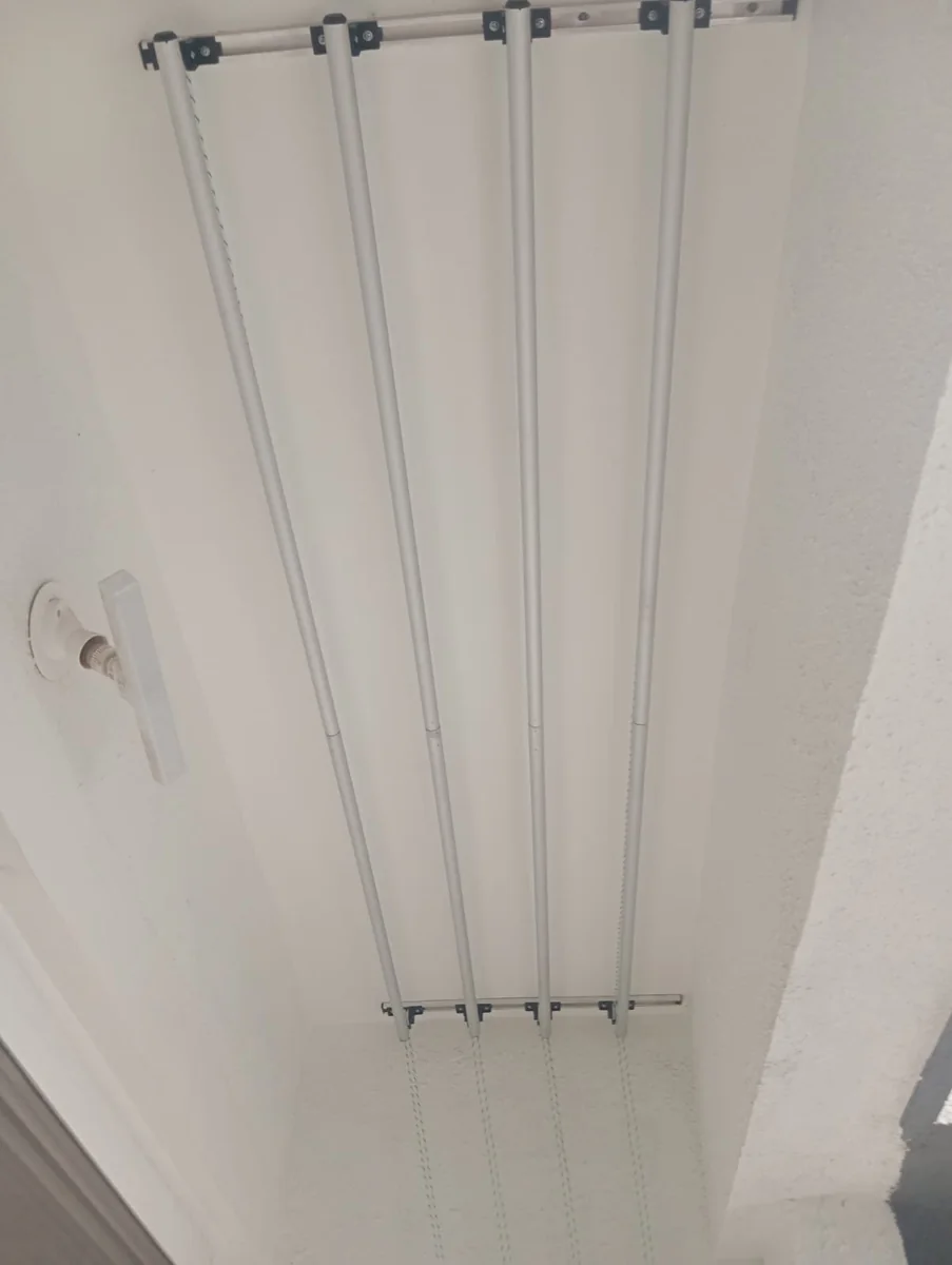 Ceiling track and rod close-up for aluminium hanger