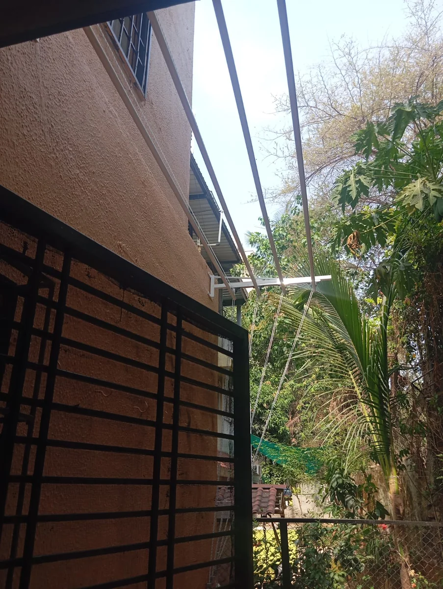 Outdoor side-mounted drying hanger installation