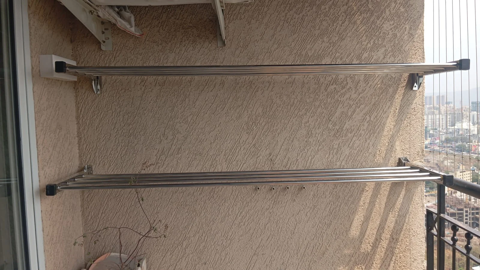 Wall mounted hanger sample with long rods